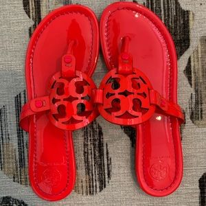 Neon pink patent leather Tory Burch sandals